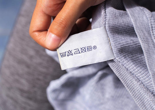 Hot, cold, or hand-wash? Here's what those laundry symbols on your clothing tags really mean.