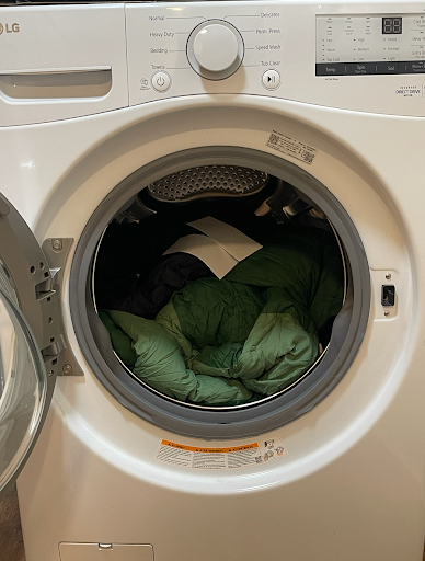 Image of a sleeping bag in the laundry machine